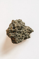 pyrite, fool's gold geode rock on white