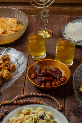 Shabbat table for the family with festive dishes and drinks