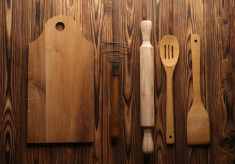 Set of wooden eco kitchen utensils on boards. Flat lay. Top view - obrazy, fototapety, plakaty