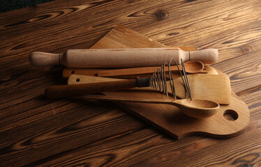Set of wooden eco kitchen utensils on boards. Flat lay. Top view - obrazy, fototapety, plakaty