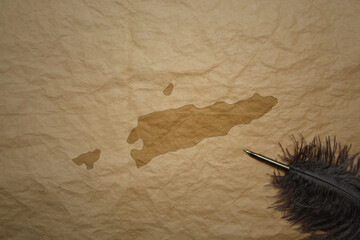 map of east timor on a old paper background with old pen