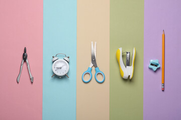 School stationery on pastel background. Top view. Flat lay