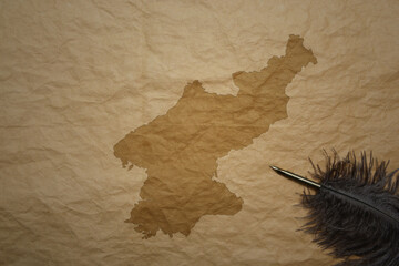 map of north korea on a old paper background with old pen