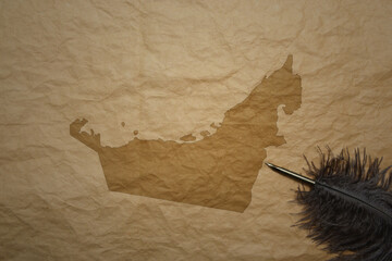 map of united arab emirates on a old paper background with old pen