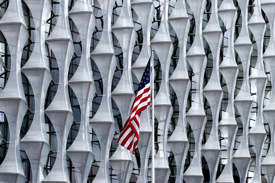 American flag waving at the Embassy of the United States of America in London, the diplomatic mission of the United States in the United Kingdom, located in Nine Elms