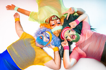 Colorful Drag Queens Embracing 80s Retro Style in Energetic Group Pose