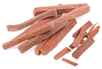 Red sandalwood sticks and chips isolated on a white background. Santali rubri. Chandan or sandalwood. - 753244435