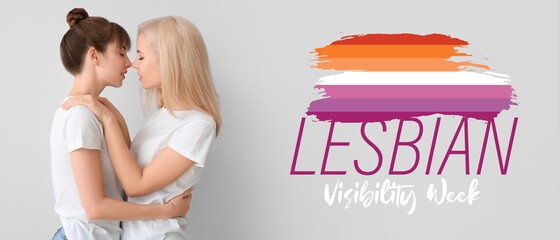 Young lesbian couple on grey background