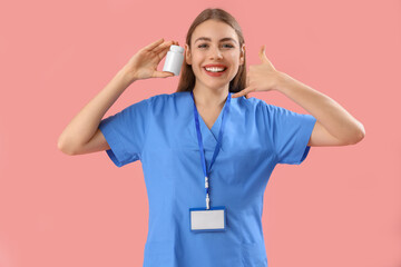 Female doctor with pill bottle showing 