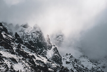Mountain peaks near Morskie Oko Lake in Poland at Winter. Tatras range - 753249290
