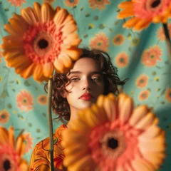 Foto op Plexiglas woman with gerberas flowers © antkevyv