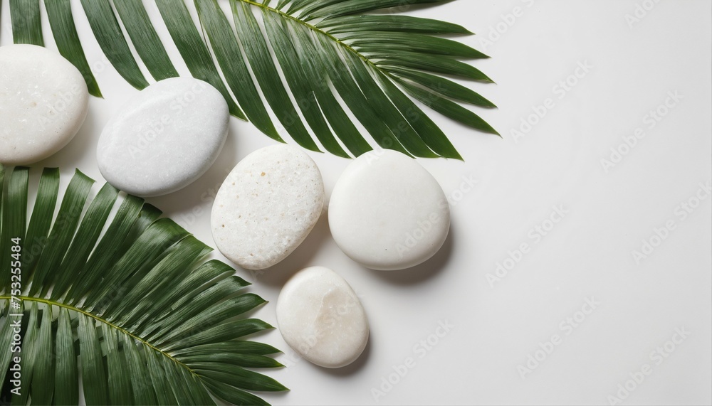 Sticker elegant arrangement of white stones and palm leaves on a pristine background, viewed from above, per