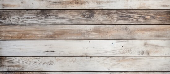 Naklejka premium Rustic Wooden Wall Featuring Diverse Shades of White and Brown Wood Textures