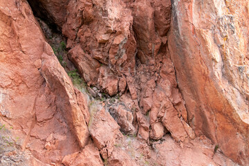 Part of the red dolomite wall of Kiutaköngäs rapids in Oulanka National Park, northern Finland	, Europe