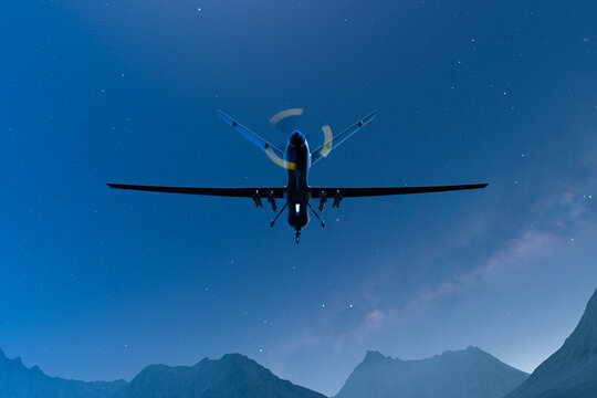 Autonomous Drone Flight in Starlit Night Sky Above Rugged Mountains