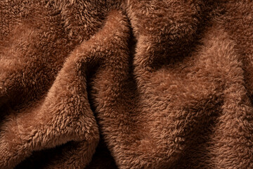 Texture of a brown faux fur as a background.