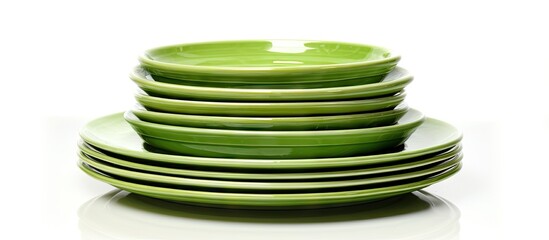 Vibrant Green Plates Piled Up on White Table Surface for Eclectic Kitchen Setting