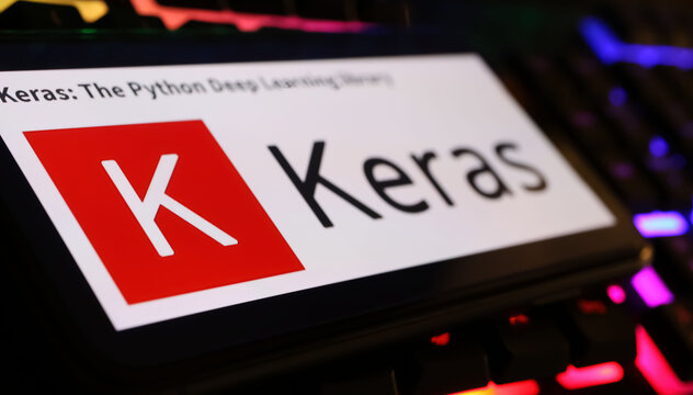 Viersen, Germany - March 1. 2024: Closeup of smartphone screen with logo lettering of Keras library on computer keyboard