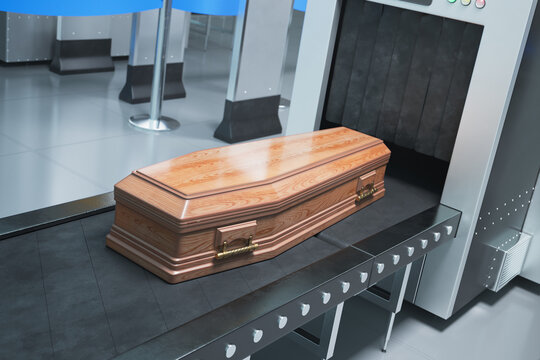 Elegantly Crafted Wooden Casket on Conveyor in Funeral Facility