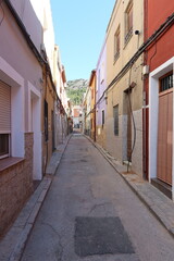 Fototapeta na wymiar Villena, Alicante, Spain, March 5, 2024: A street in the old neighborhood of Villena, Alicante, Spain