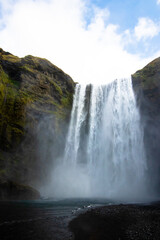 A waterfall in Iceland in Scandinavia in northern Europe, in the land of fire and ice,
