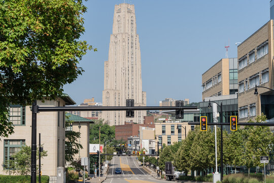 Pittsburgh, Pennsylvania - July 23, 2023: Forbes Avenue in the Oakland area of Pittsburgh with The Cathedral of Learning in the background. 