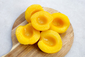 Peach halves in syrup. Fruity desserts