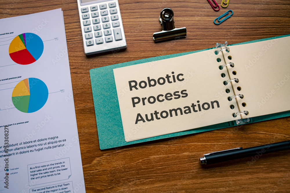 Poster there is notebook with the word robotic process automation. it is as an eye-catching image.
