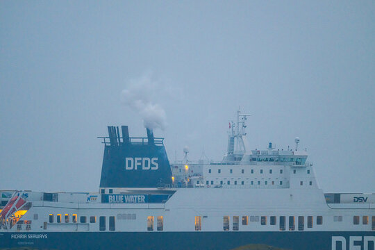 Gothenburg, Sweden - February 29 2024: Freight ferry DFDS Ficaria Seaways leaving port of Gothenburg.