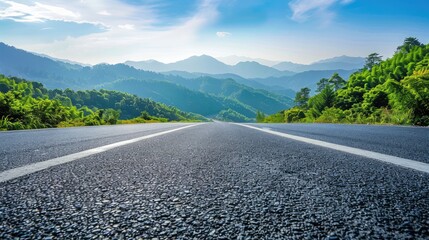 
Asphalt highway road and green forest with mountain natural landscape under blue sky, nature...