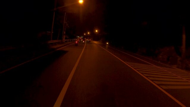January 12, 2024 - Patong, Phuket Thailand. Driving through the outskirts of Patong and into the city on a quiet night.