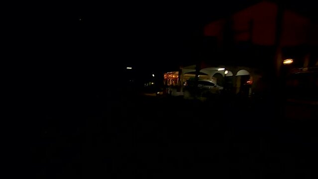 January 14, 2024 - Rawai, Phuket Thailand. Driving down a dimly lit road in Rawai at night.