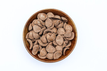 Chocos in a wooden bowl on white background top view 