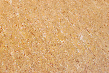 Yellow polished granite texture as background
