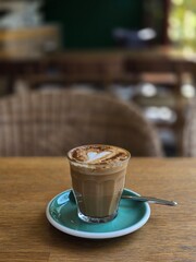 Nice Texture of Latte art on hot latte coffee . Milk foam in heart shape leaf tree on top of latte art from professional barista artist
- 753337053