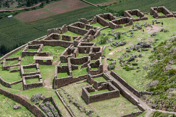 The Pisac Ruins are an archaeological site located in the Sacred Valley of Peru,. These ruins are part of the larger Inca Empire and are known for their impressive agricultural terraces. - obrazy, fototapety, plakaty