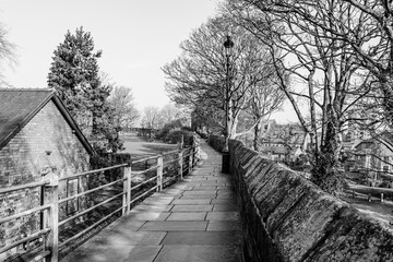 Chester City Walls, ancient defensive walls surrunding the old town of Chesteer, Cheshire, England, UK in black and white - 753338261