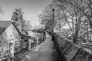 Chester City Walls, ancient defensive walls surrunding the old town of Chesteer, Cheshire, England, UK in black and white - 753338266