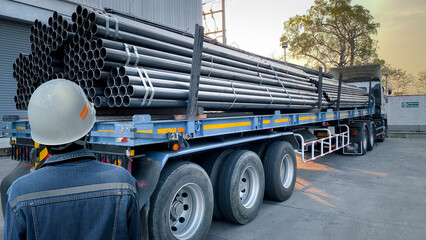 Steel pipes are placed in factory, steel pipe for fabrication,Stacked together of steel tube, close-up.steel pipes in  in warehouses awaiting delivery.at thailand