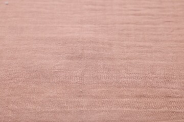 Texture of soft pastel fabric as background, closeup