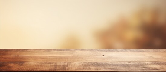 Empty wooden table on soft background