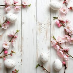 Top view of White happy easter eggs with Sakura blossom flower on white wood spring background.