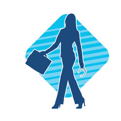 Silhouette of a business woman wearing office work women suit in pose carrying briefcase