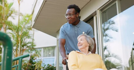 Nursing home, wheelchair and black man with senior woman, person with a disability and rehabilitation. Recovery, old lady and pensioner with caregiver and conversation with help, support and healing