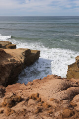 Waves breaking on cliffs, San Diego, California