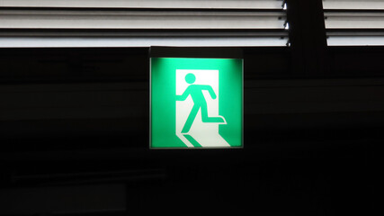 Emergency exit pictogram: emergency evacuation route in case of disaster