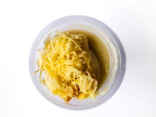 Durian Cendol Ice Drink topped with grated cheese and slices of bread