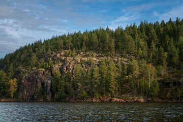 Naklejka premium Lake Ladoga near the village Lumivaara on a sunny autumn day, Ladoga skerries, Lakhdenpokhya, Republic of Karelia, Russia