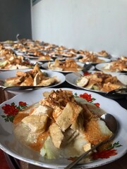 Lentog Tanjung. Traditional food from Kudus City, Indonesia, consisting of young jackfruit soup, tofu and coconut milk.