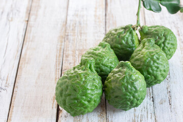Close up bergamot on wooden table background.